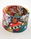 Fun and colorful, get trendy this season with our Ed Hardy style cuff bracelet.