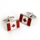 Oh Canada! Pay homage to this great nation with our Dashing Canadian Flag Cufflinks. Proudly display the cherished maple leaf whether youre donning a formal tuxedo or just your daily dress shirt. The pair comes packaged in an attractive personalized silver-tone case featuring the name of the recipient. Yes, we do ship to Canada. Please allow extra time and there is an additional $12.00 for shipping. Either place your order online or call us at 800-683-0027.