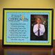 Our -painted hardboard plaque makes a handsome gift idea for a young boy making his First Communion. Features a printed facing and a 3 38" x 5" photo opening. Hang or stand. Shrink wrapped with corner protectors.Hardboard 10" x 7 12".
