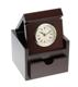 This gorgeous clock will add lasting charm to any room! The lustrous chestnut-colored wood box contains a classic round-face clock; simply flip the lid to reveal the elegant, cleverly-hidden timepiece. This sophisticated clock is embellished with black Roman numerals on a white background. Tuck away small, precious objects for safe-keeping in the clocks diminutive keepsake drawer. This perfectly-sized 4 3/4 x 4 1/4" x 3 3/4" clock box also makes a great travel item for the busy executive or professional on the go! Add flair to this gift by personalizing it with a name or logo on the box top. 