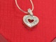 Send a romantic and meaningful gift idea to someone special. Packaged in a heart shaped gift box. Sterling Silver 18" Chain with Lobster Clasp Heart pendant with Swarovski Crystals