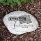 Honor a loved one with our Military Garden Stone. Made of durable resin and has a real stone look. Lightweight, waterproof, measuring 11 W x 8 H x 1  D. This Garden Accent Stones is designed for indoor or outdoor use. Engraved with In Loving Memory - Our Hero - Some Gave All 